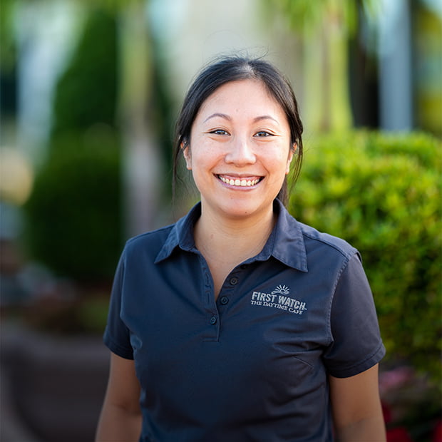 Liz Cheung stands in front of her Venice, Florida First Watch location